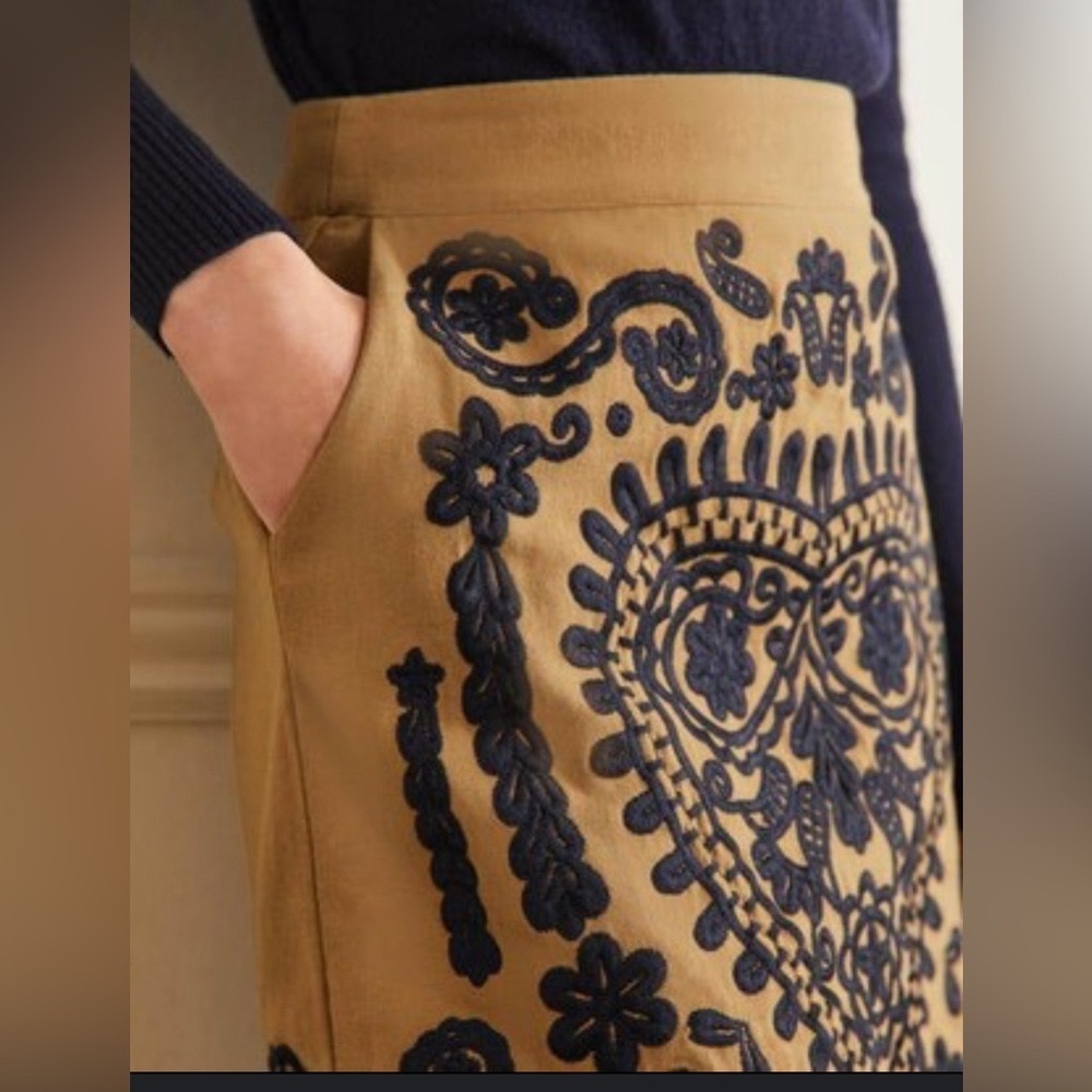 Boden tan skirt with navy embroidery.  Never been worn.